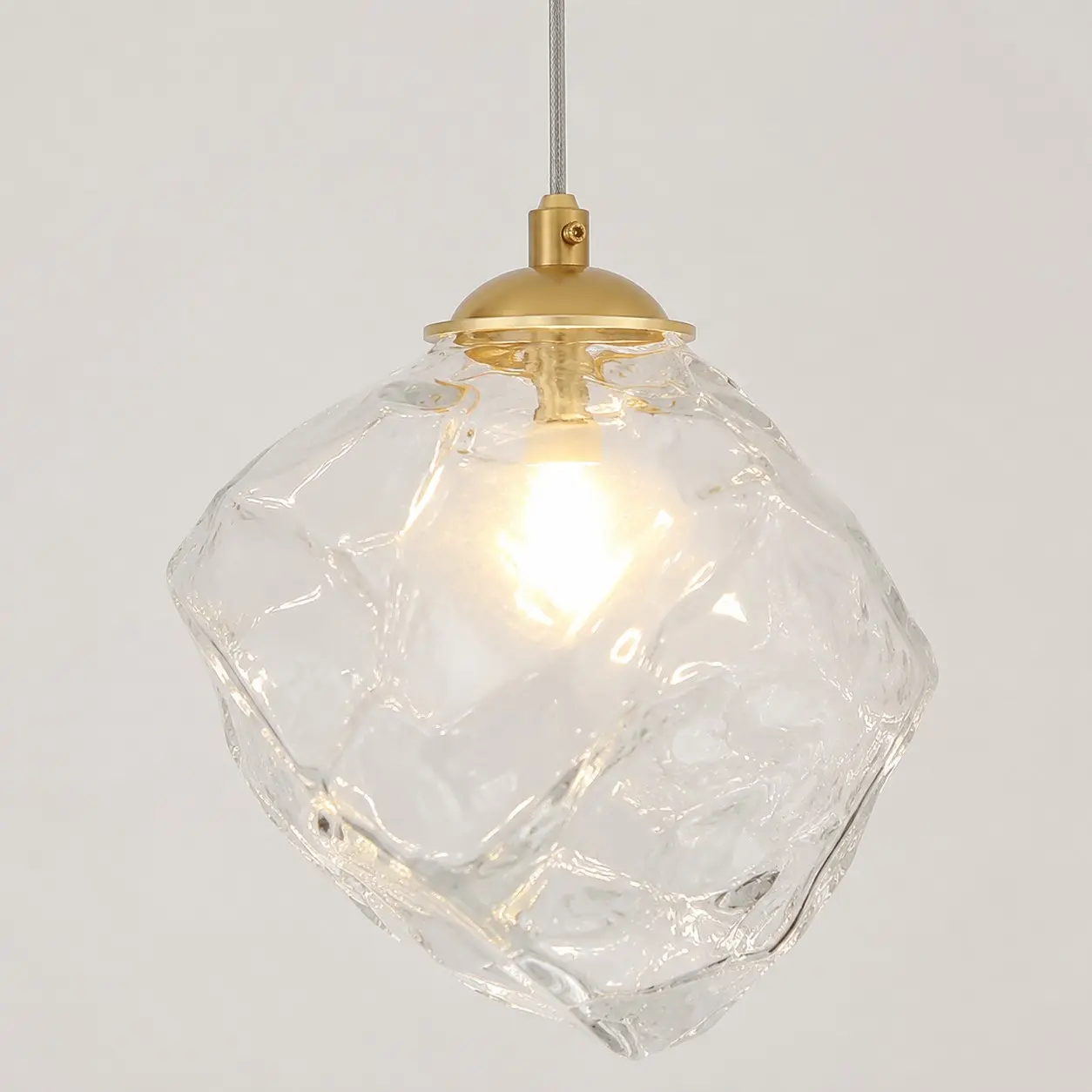 Close-up of irregular transparent glass shade
