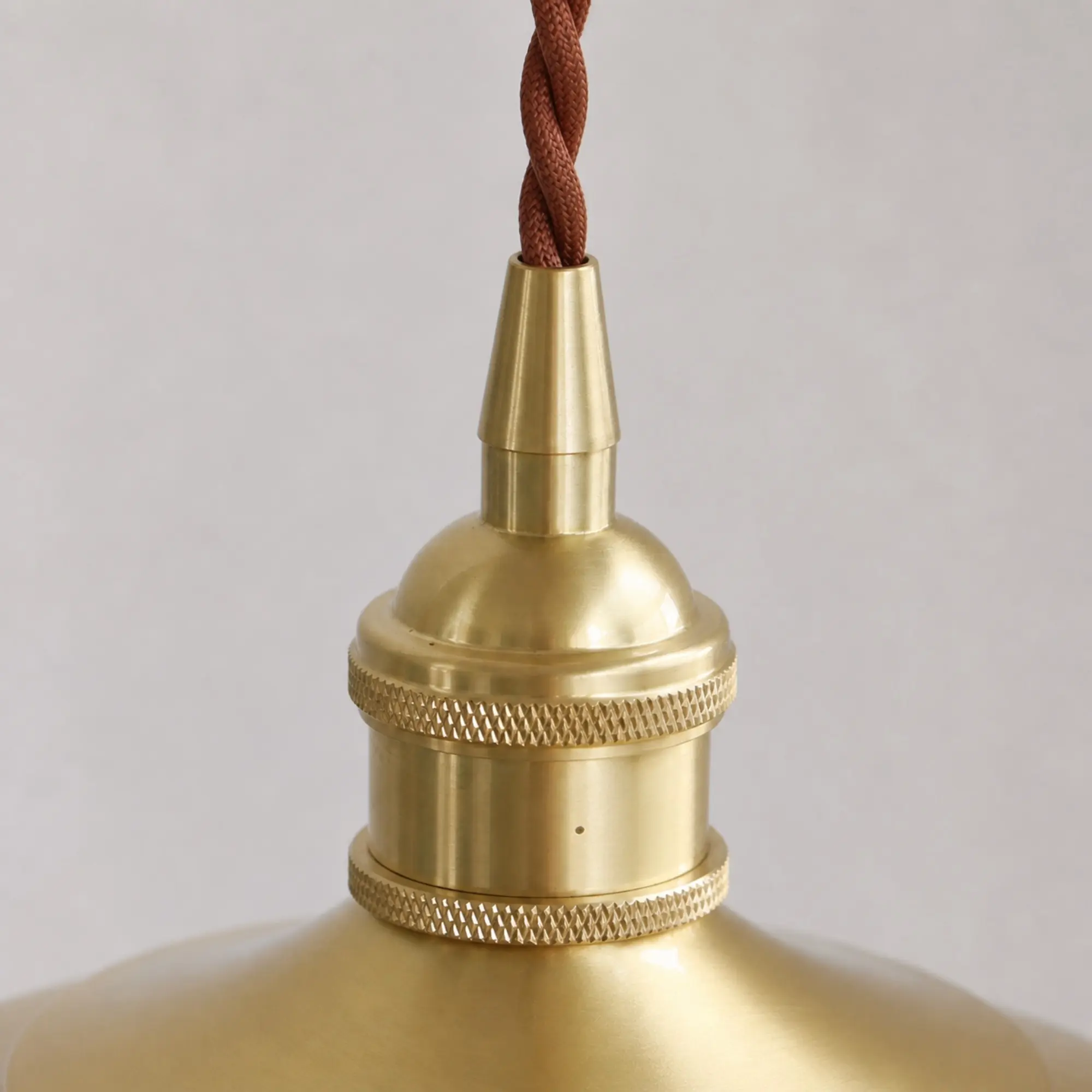 Close-up of the braided cord and brass cord grip