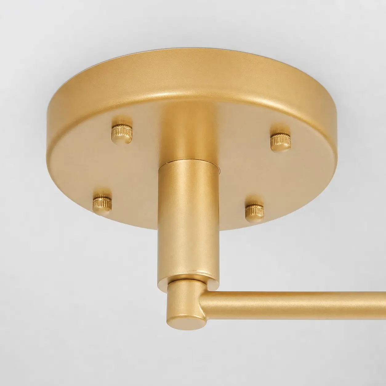 Gold ceiling canopy and movable arm connection detail