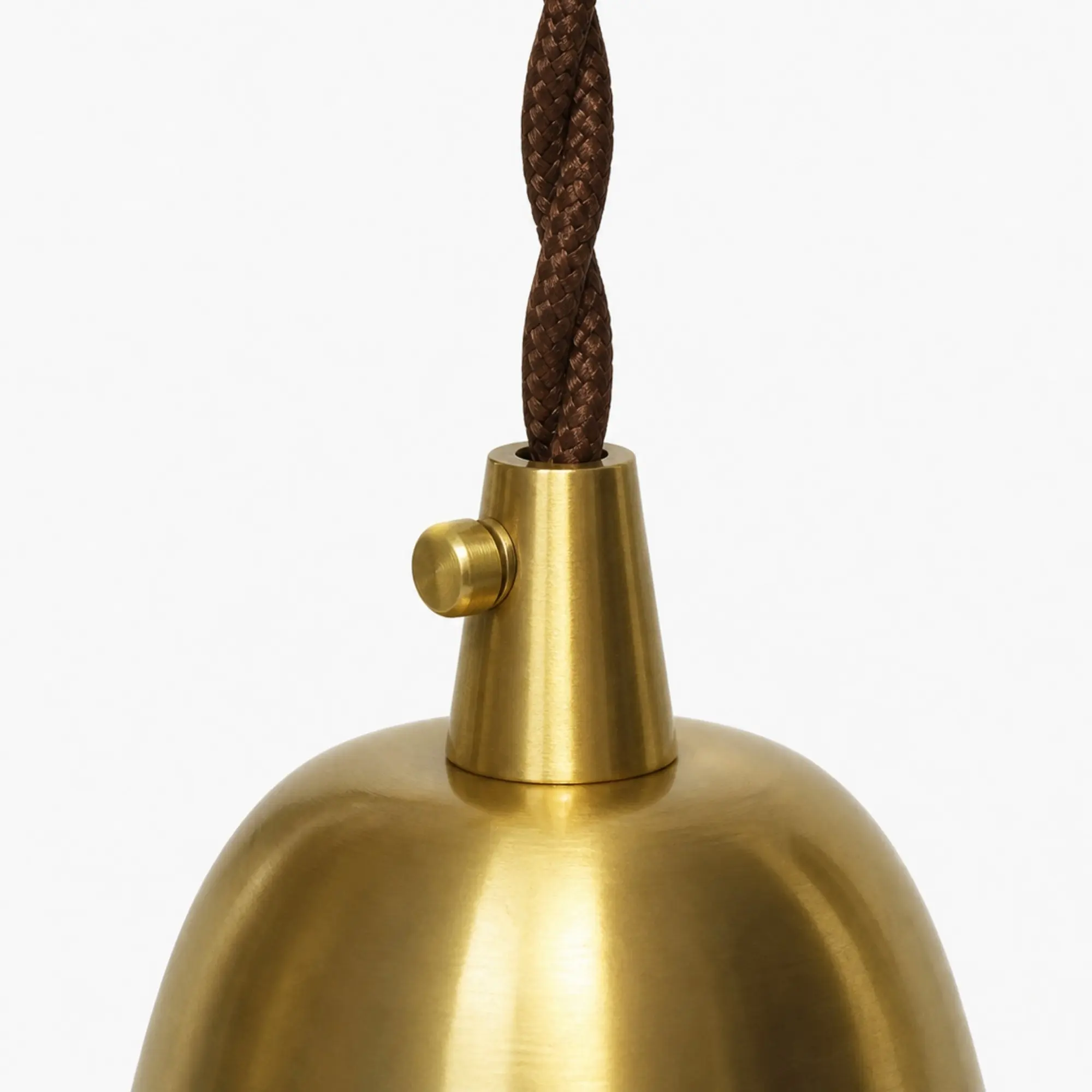 Natural brass fastener and shade connection detail