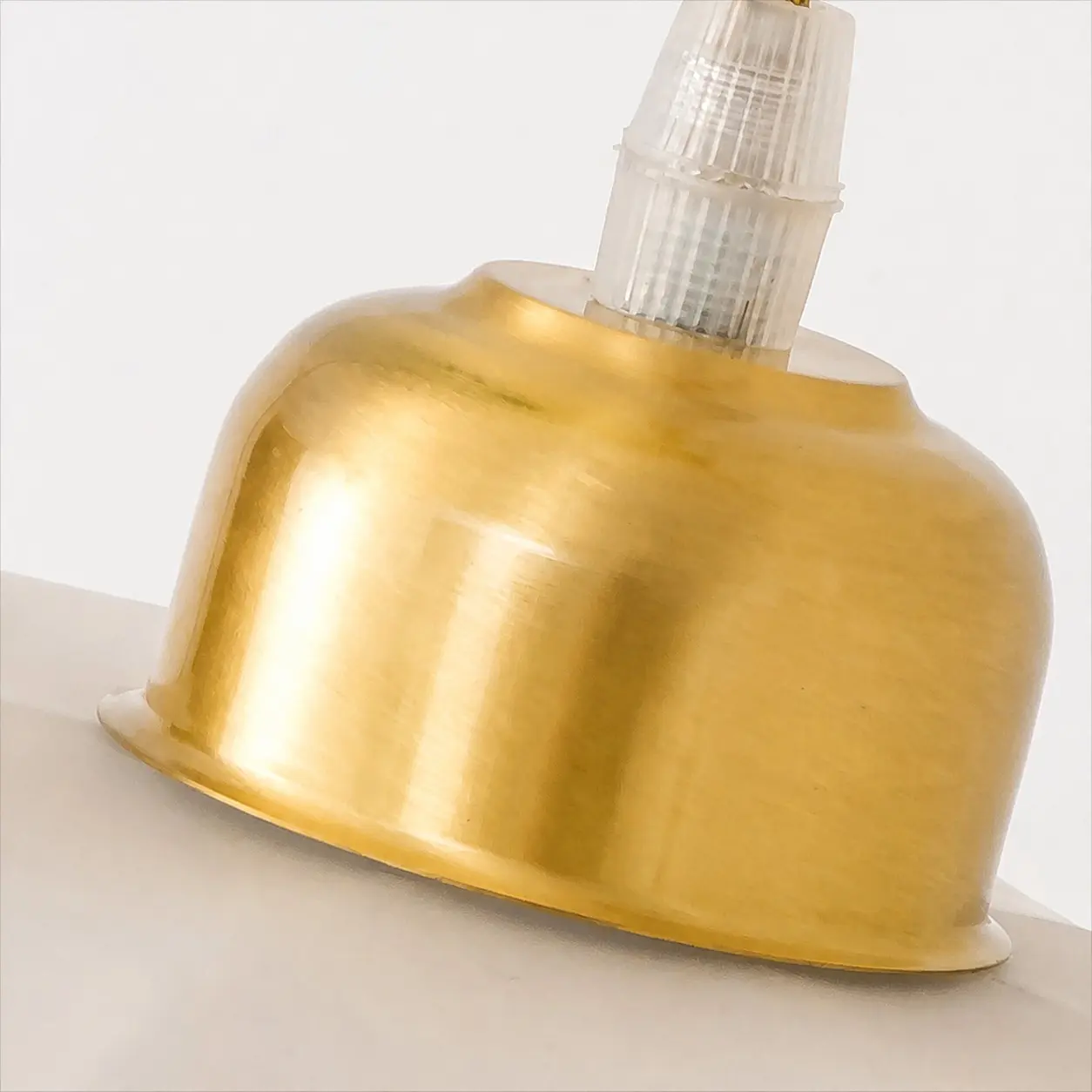Sculpted profile of the pendant shade