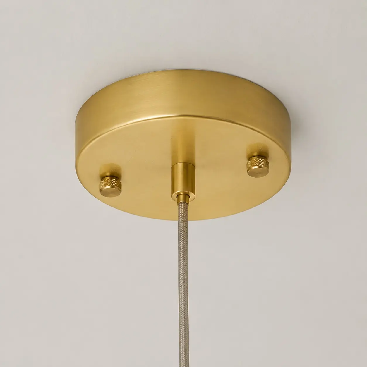 Close-up of brass-toned ceiling canopy